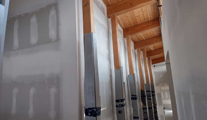 Pano drywall down corridor